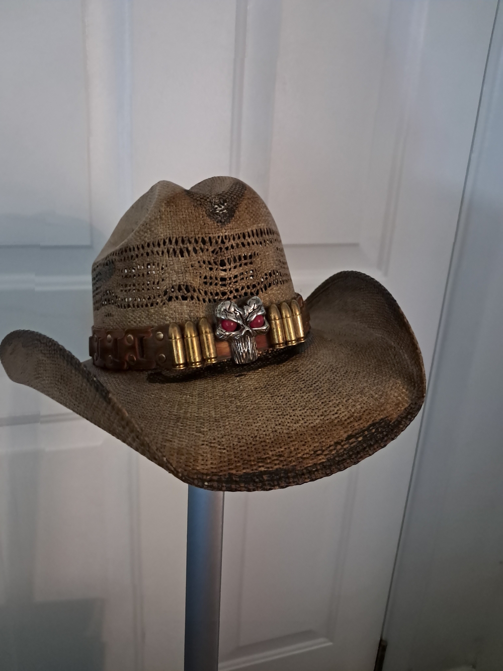 Men's Distressed Brown Cowboy Hat with Bullet Band and Skull Accent